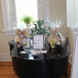 Door Prizes - Opera House Gift Card and Figaro Market Gift Baskets